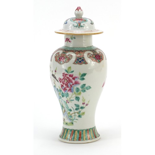 228 - Chinese porcelain baluster vase and cover hand painted in the famille rose palette with a bird among... 