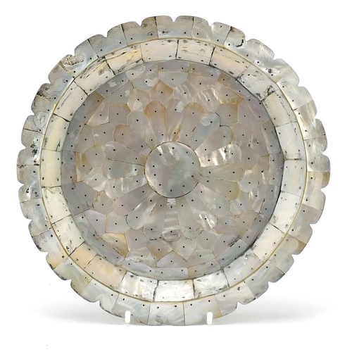 132 - Indian Goa mother of pearl plate formed of pinned sections, 22cm in diameter