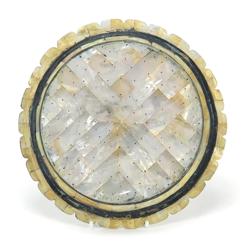 132 - Indian Goa mother of pearl plate formed of pinned sections, 22cm in diameter