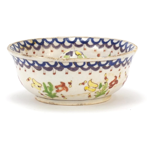 224 - Turkish Kutahya lemon squeezer hand painted with flowers, 14.5cm in diameter