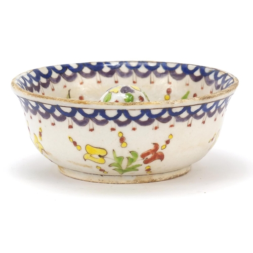 224 - Turkish Kutahya lemon squeezer hand painted with flowers, 14.5cm in diameter