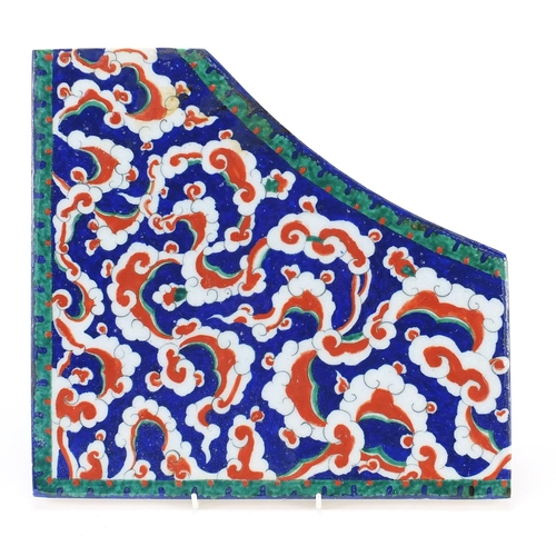 392 - Large Turkish Iznik tile corner fragment hand painted with foliage, 30.5cm x 29cm