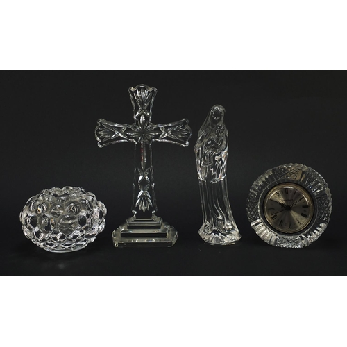 906 - Crystal glassware comprising a Waterford eight inch standing cross, Waterford figure of Madonna, Orr... 