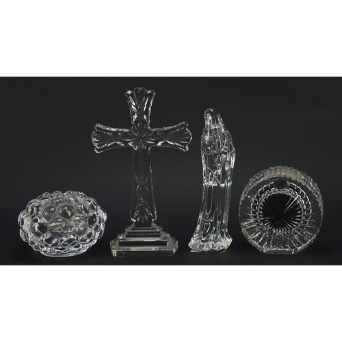 906 - Crystal glassware comprising a Waterford eight inch standing cross, Waterford figure of Madonna, Orr... 