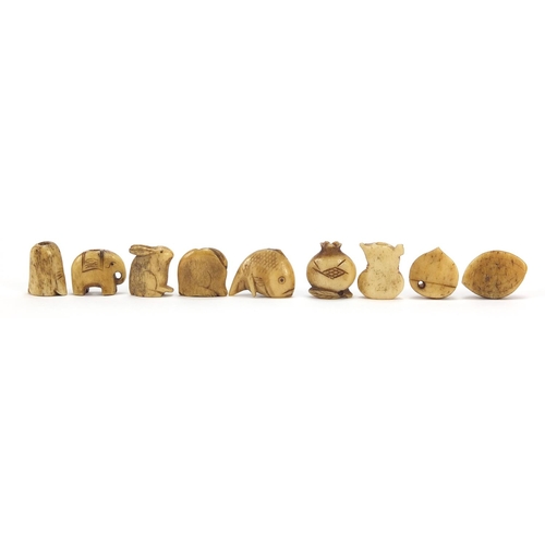 285 - Nine Japanese carved bone Ojimes including gourd vessel and fish, the largest 2cm wide