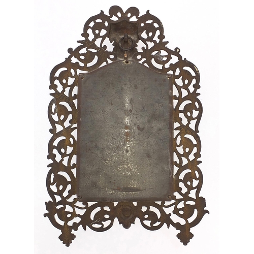 604 - 19th century gilt metal acorn man design mirror with bevelled plate, B & H 3504 to the reverse, 38.5... 