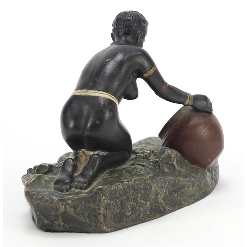 145 - Austrian cold painted bronze of a semi nude African female collecting water, 13.5cm wide