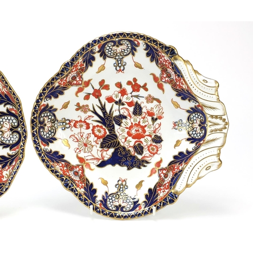 868 - Three Royal Crown Derby Old Imari pattern plates/dishes, the largest 24.5cm in length