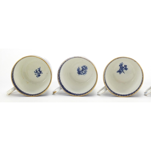 895 - Set of six Coalport blue and white trios decorated with flowers, each cup 6.5cm high