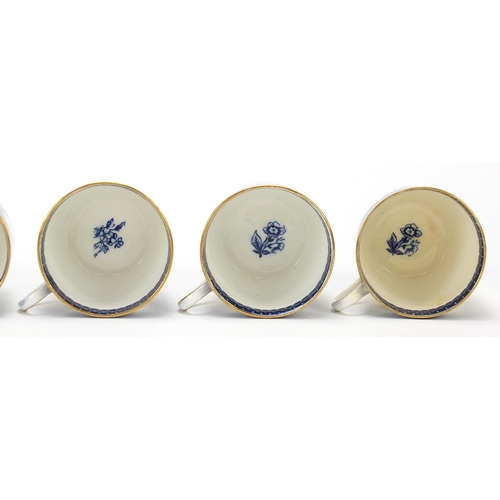 895 - Set of six Coalport blue and white trios decorated with flowers, each cup 6.5cm high