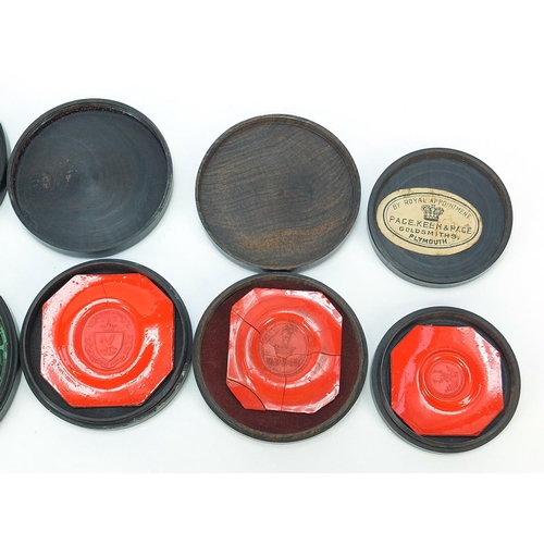 238 - Six 19th century wax seals housed in hardwood cases, the largest case with inscribed paper label, 5.... 