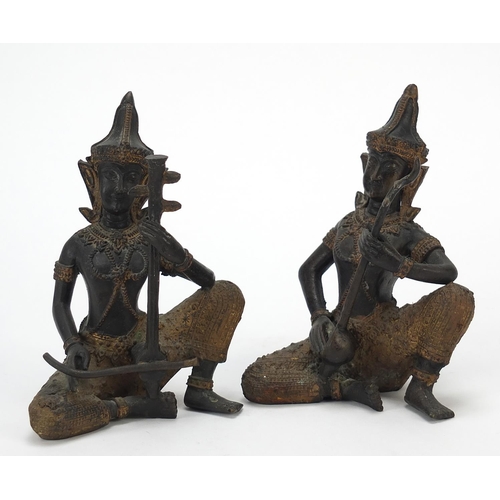 399 - Pair of Thai partially gilt bronze figures of musicians, each 15cm high