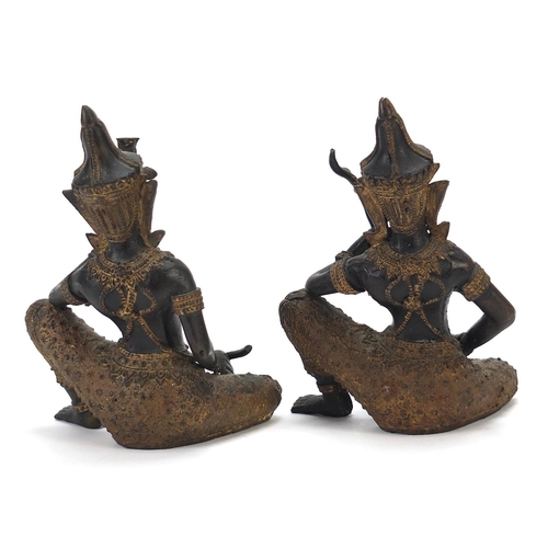 399 - Pair of Thai partially gilt bronze figures of musicians, each 15cm high