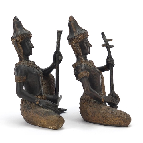 399 - Pair of Thai partially gilt bronze figures of musicians, each 15cm high