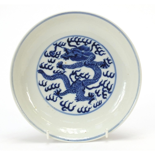 826 - Chinese blue and white porcelain shallow dish hand painted with dragons chasing a flaming pearl amon... 