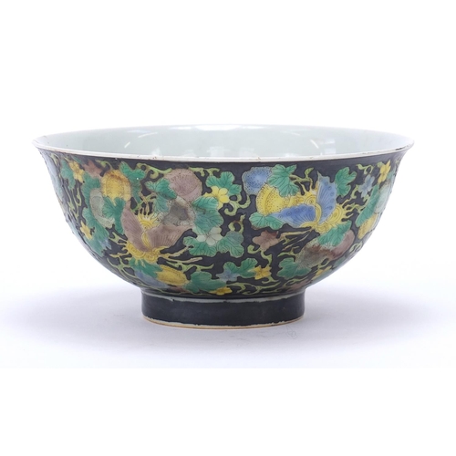 277 - Chinese porcelain footed bowl hand painted in the famille noir palette with butterflies amongst flow... 