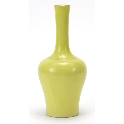 103 - Chinese porcelain vase having a yellow glaze, six figure character marks to the base, 24cm high