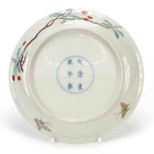 11 - Good Chinese porcelain dish finely hand painted with butterflies amongst blossoming berry trees, six... 