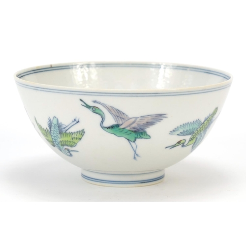 467 - Chinese porcelain doucai footed bowl hand painted with cranes and peach trees, six figure character ... 