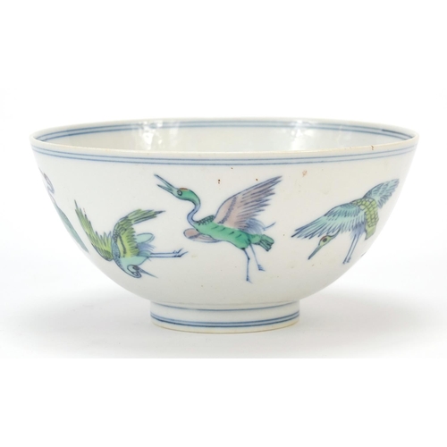 467 - Chinese porcelain doucai footed bowl hand painted with cranes and peach trees, six figure character ... 