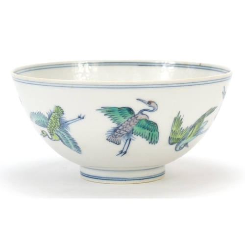 467 - Chinese porcelain doucai footed bowl hand painted with cranes and peach trees, six figure character ... 