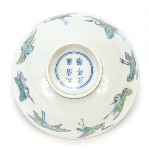 467 - Chinese porcelain doucai footed bowl hand painted with cranes and peach trees, six figure character ... 