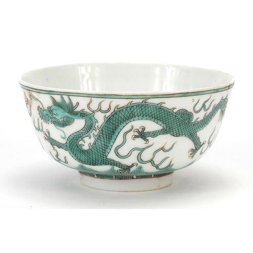 824 - Chinese porcelain bowl hand painted in green and iron red with two dragons chasing a flaming pearl a... 