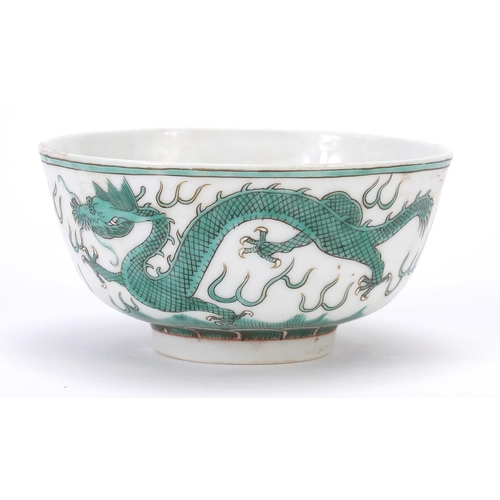 824 - Chinese porcelain bowl hand painted in green and iron red with two dragons chasing a flaming pearl a... 