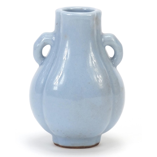 188 - Chinese porcelain quatrefoil vase with ears having a clair de lune type glaze, 10cm high