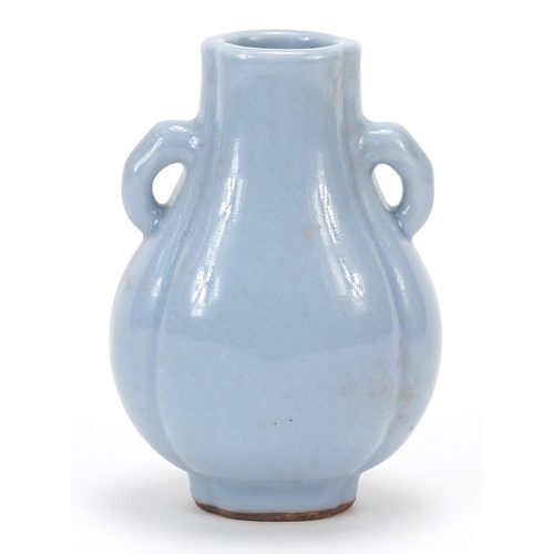 188 - Chinese porcelain quatrefoil vase with ears having a clair de lune type glaze, 10cm high