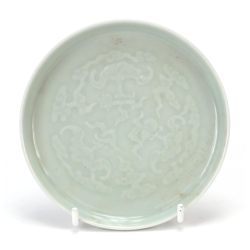 719 - Good Chinese porcelain footed dish having a celadon glaze, finely decorated in low relief and incise... 