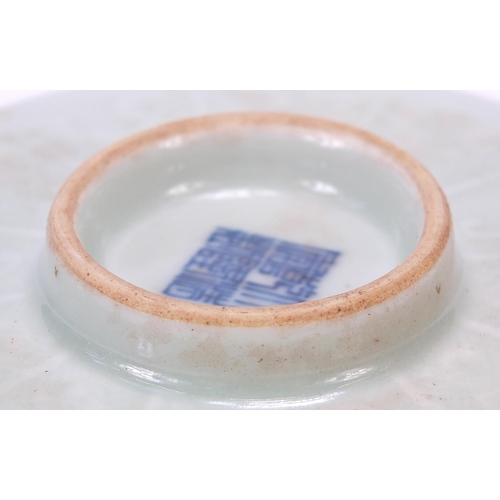 719 - Good Chinese porcelain footed dish having a celadon glaze, finely decorated in low relief and incise... 