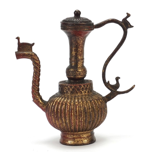 229 - Islamic gilt bronze lidded water jug, 24cm high