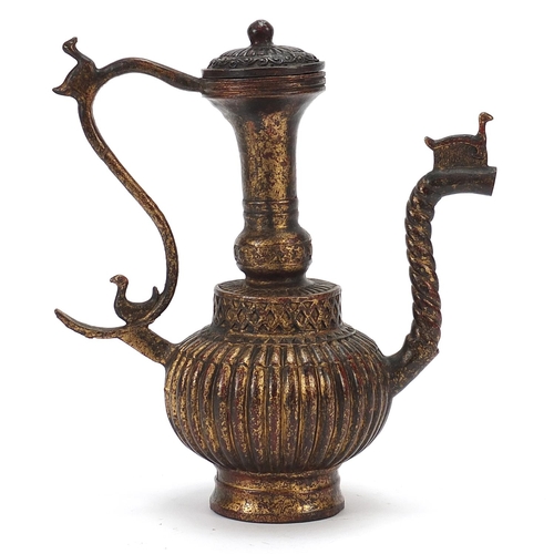 229 - Islamic gilt bronze lidded water jug, 24cm high