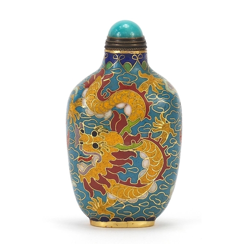 726 - Chinese bronze and cloisonné snuff bottle with hardstone stopper enamelled with two dragons amongst ... 