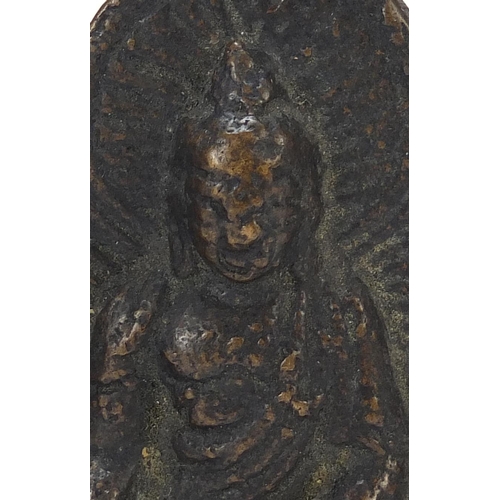 401 - Three Nepalese patinated bronze plaques of Buddha with display stands, the largest 11cm high