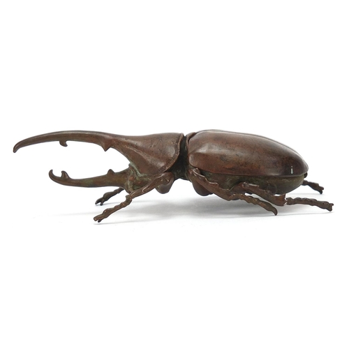 116 - Large Japanese patinated bronze beetle with articulated back, 11cm in length