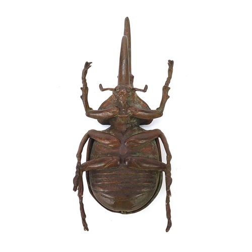 116 - Large Japanese patinated bronze beetle with articulated back, 11cm in length