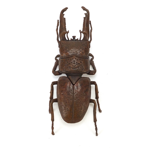 292 - Large Japanese patinated bronze beetle with articulated back, impressed marks to the underside, 13.5... 