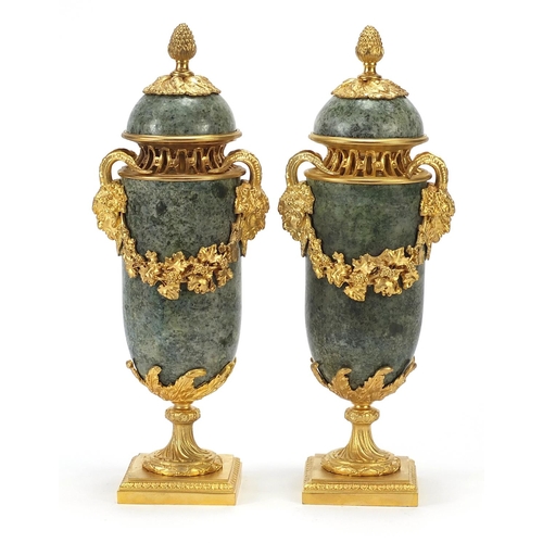 606 - Pair of French gilt bronze and marble pedestal vases and covers with faun head handles, each 32cm hi... 