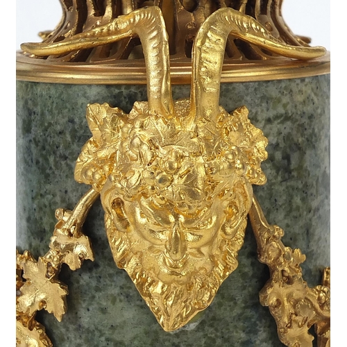 606 - Pair of French gilt bronze and marble pedestal vases and covers with faun head handles, each 32cm hi... 