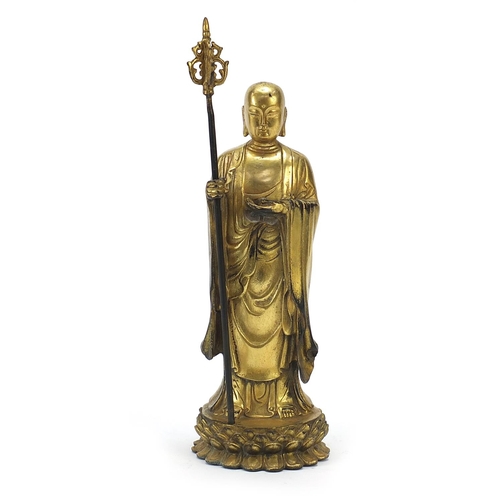 568 - Chino Tibetan gilt bronze figure of a monk, 27cm high