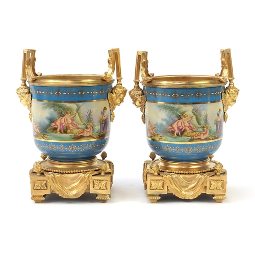 861 - Pair of French gilt bronze mounted porcelain pots in the style of Sevres decorated with classical fi... 