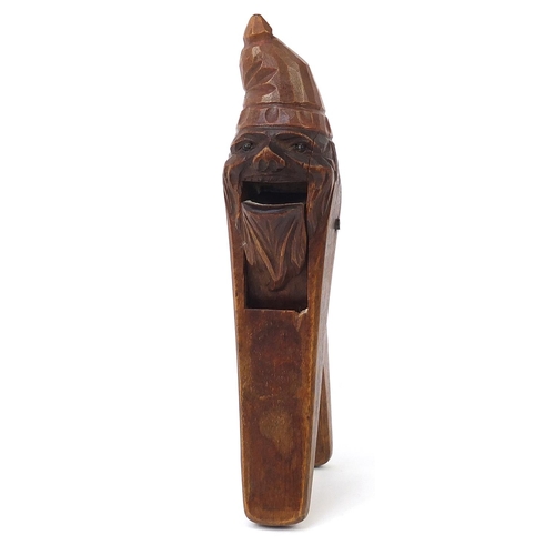 142 - Pair of Black Forest wooden nutcrackers carved in the form of a gnome, 19cm in length