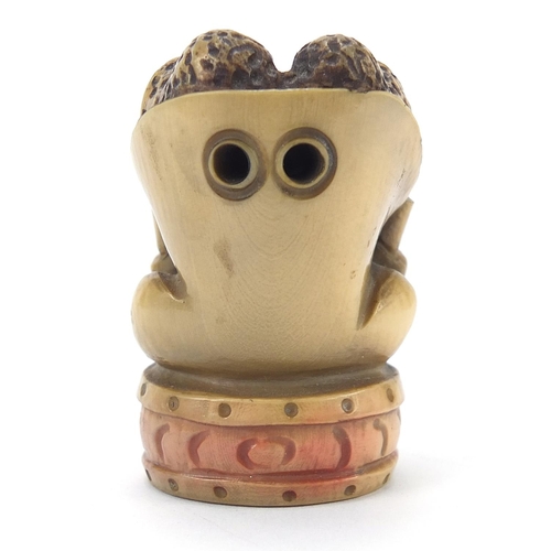 206 - ** WITHDRAWN ** Japanese carved ivory netsuke of an acrobat, character marks to the base, 4.5cm in l... 