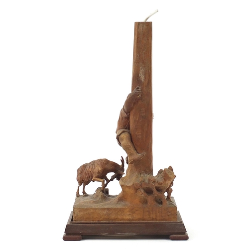 586 - German prisoner of war carved wood lampstand in the form of a goat beside a boy climbing a tree trun... 