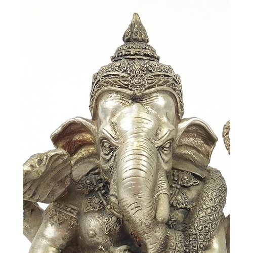 400 - Indian silver coloured metal figure of Ganesh, 23cm high