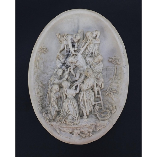 1040 - White marble style oval plaque decorated in relief with Christ falling from the cross, inset plaque ... 