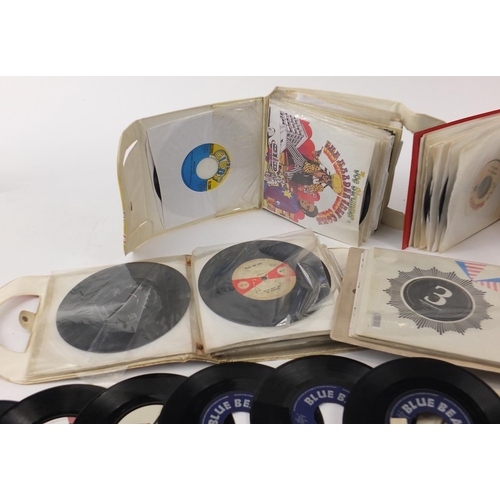 2617 - 45rpm records arranged in albums including promos, The Dynamics and Big Dada