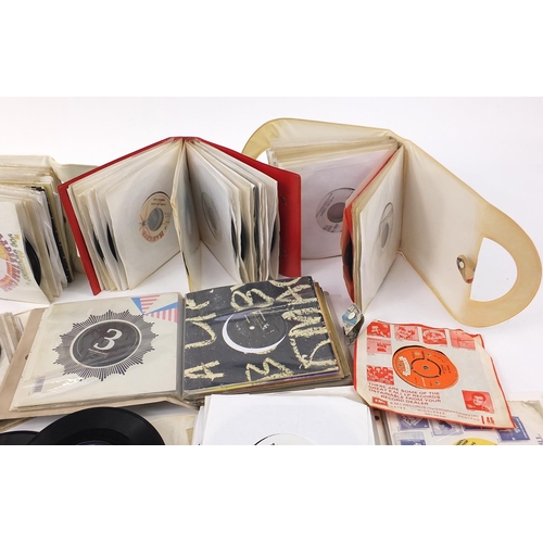 2617 - 45rpm records arranged in albums including promos, The Dynamics and Big Dada